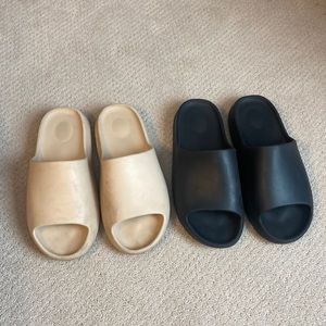 2 pairs of Yeezy Slides